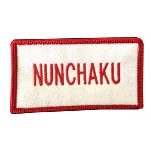 Écusson avec inscription Nunchaku.
